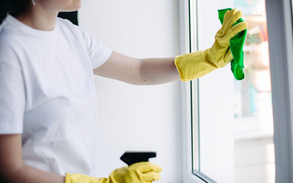 crop-incognito-brunette-housewife-cleaning-dirty-window-housemaid-wearing-white-t-shirt-yellow-protective-gloves-wiping-glass-with-rag-concept-housework-apartment-service